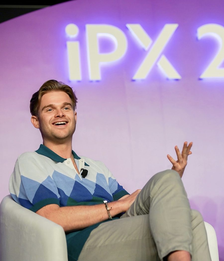 Joey Asleson speaking at the iPX partnership marketing conference